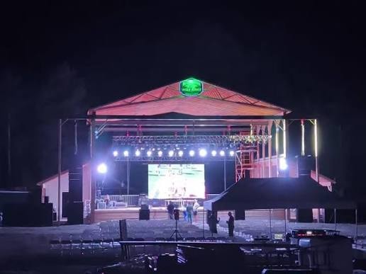 Wolf Ridge Amphitheater stage lit up at night with LED screen and stage lighting